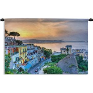 Wandkleed Napels - Kleurrijke lucht boven de Italiaanse stad Napels door de zonsondergang Wandkleed katoen 150x100 cm - Wandtapijt met foto