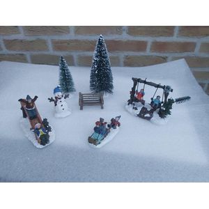 kerstfiguren speeltuin schommel glijbaan kerstdorp