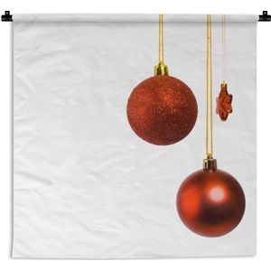 Wandkleed Kerst - Een paar rode kerstballen met een rode kerstster Wandkleed katoen 150x150 cm - Wandtapijt met foto