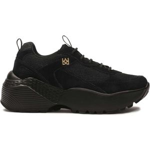 Black sneakers on a solid sole