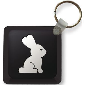Sleutelhanger - Een illustratie van een konijn op een zwarte achtergrond - Plastic - Rond - Uitdeelcadeautjes