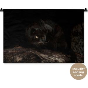 Wandkleed Dieren - Zwarte panter in een donker bos Wandkleed katoen 90x60 cm - Wandtapijt met foto