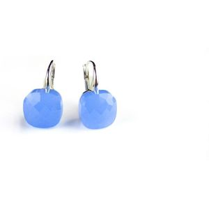 Zilveren oorringen oorbellen model pomellato licht blauwe steen