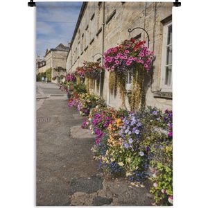 Wandkleed Cotswolds - Bloemen fleuren de kalkstenen muren op in Cotswolds Wandkleed katoen 60x90 cm - Wandtapijt met foto