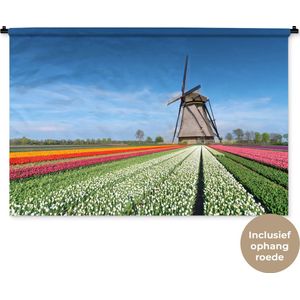 Wandkleed Landschappen Nederland - Molen tussen de tulpen in Nederland Wandkleed katoen 150x100 cm - Wandtapijt met foto