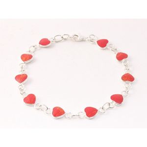 Zilveren hartjes armband met rode koraal steen