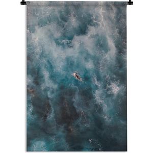 Wandkleed Zee Vogelperspectief - Surfer op de oceaan in vogelperspectief Wandkleed katoen 60x90 cm - Wandtapijt met foto