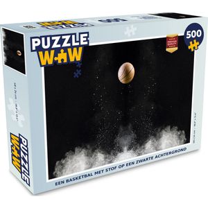 Puzzel Een basketbal met stof op een zwarte achtergrond - Legpuzzel - Puzzel 500 stukjes