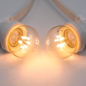 LumenXL - wit lichtsnoer voor buiten - koppelbaar 25 meter 50 fittingen - 0,7 watt 2000K lampen LEDs op korte stokjes