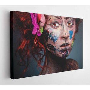 Young woman with glamorous bizarre face art red curly hair with clips and glowing brown eyes on dark blue background in studio - Modern Art Canvas - Horizontal - 293064002 - 80*60 Horizontal