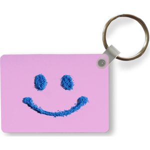 Sleutelhanger - Glimlachende smiley gemaakt van poeder - Uitdeelcadeautjes - Plastic
