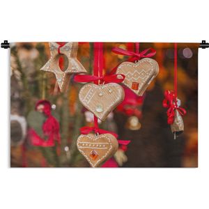 Wandkleed Kerst - De hangende hartendecoratie op de markt van Trente tijdens kerst Wandkleed katoen 90x60 cm - Wandtapijt met foto