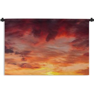 Wandkleed Zonsondergang op het Strand  - Vurige zonsondergang met wolken Wandkleed katoen 90x60 cm - Wandtapijt met foto