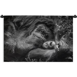 Wandkleed Junglebewoners - Liefdevolle Orang-oetan met jong in zwart-wit Wandkleed katoen 90x60 cm - Wandtapijt met foto
