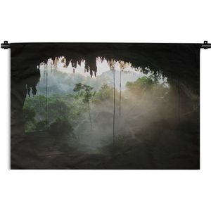 Wandkleed Diep in de jungle - Uitzicht vanuit grot in Borneo Wandkleed katoen 150x100 cm - Wandtapijt met foto