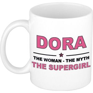 Naam cadeau Dora - The woman, The myth the supergirl koffie mok / beker 300 ml - naam/namen mokken - Cadeau voor o.a verjaardag/ moederdag/ pensioen/ geslaagd/ bedankt