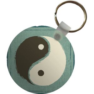 Sleutelhanger - Een illustratie van Yin en Yang tegen een blauwe achtergrond - Plastic - Rond - Uitdeelcadeautjes