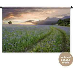 Wandkleed Bloemenvelden - Blauwe en paarse bloemen zonsondergang Wandkleed katoen 120x80 cm - Wandtapijt met foto