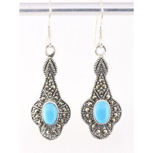 Zilveren oorbellen met blauwe turkoois en marcasiet