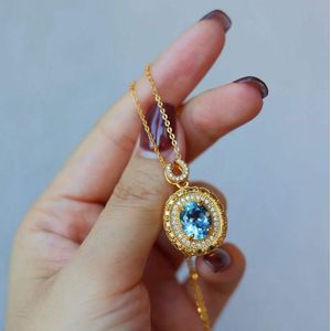 Blauwe Topaas Ovale Hanger met Gouden Omlijsting – Met Ketting