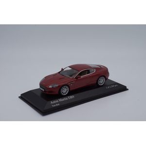 The 1:43 Diecast Modelcar of the Aston Martin DB9 of 2009 in Metallic Red. This scalemodel is limited by 1392pcs.The manufacturer is Minichamps.