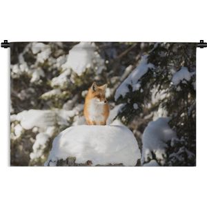 Wandkleed Bosleven - Vos staat op besneeuwde steen Wandkleed katoen 120x80 cm - Wandtapijt met foto