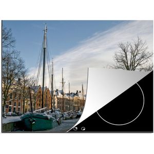 KitchenYeah® Inductie beschermer 59x52 cm - Groningen - Grachtenpand - Winter - Kookplaataccessoires - Afdekplaat voor kookplaat - Inductiebeschermer - Inductiemat - Inductieplaat mat