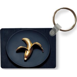Sleutelhanger - Gouden banaan op een donkere achtergrond - Uitdeelcadeautjes - Plastic