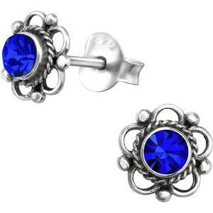 Joy|S - Zilveren Bali bloem oorbellen - 7 mm - blauw kristal - geoxideerd