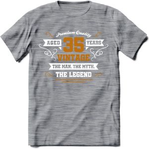 35 Jaar Legend T-Shirt | Goud - Wit | Grappig Verjaardag en Feest Cadeau Shirt | Dames - Heren - Unisex | Tshirt Kleding Kado | - Donker Grijs - Gemaleerd - XL