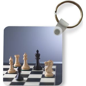Sleutelhanger - De witte kant is in de meerderheid tijdens het schaken - Plastic - Rond - Uitdeelcadeautjes