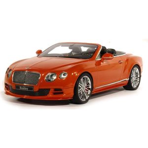 De 1:18 Diecast Modelcar van de Bentley Coninental GT Speed Convertible van 2013 in Orange. Dit schaalmodel is begrensd door 999 stuks. De fabrikant is Minichamps. Dit model is alleen online beschikbaar.