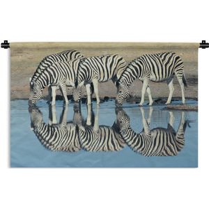 Wandkleed Namibië - Zebra's drinken Wandkleed katoen 120x80 cm - Wandtapijt met foto