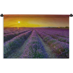 Wandkleed De lavendel - Oranje zonsondergang boven veld gevuld met lavendel Wandkleed katoen 90x60 cm - Wandtapijt met foto