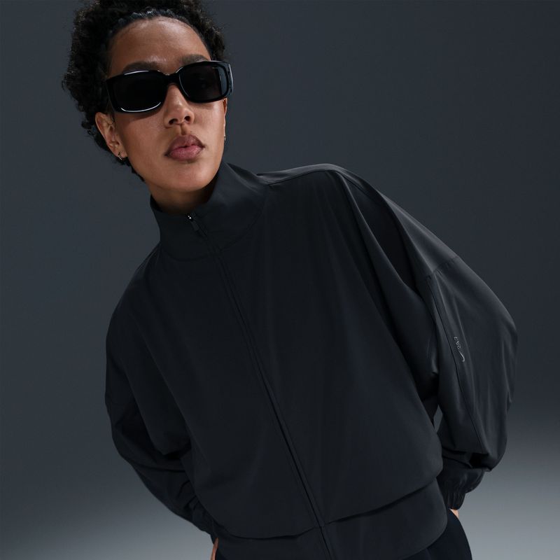Nike 24.7 PerfectStretch oversized damesjack met Dri-FIT en rits over de hele lengte - Zwart