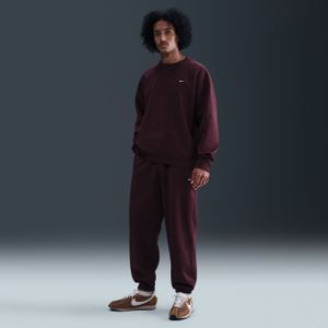 Nike Solo Swoosh fleecebroek met boorden voor heren - Rood