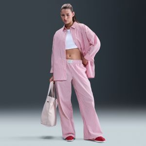 Nike Chill Poplin ruimvallende gestreepte damesbroek met halfhoge taille - Roze