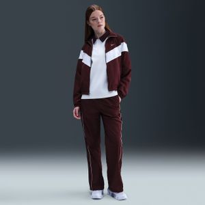 Nike Windrunner geweven damesbroek met hoge taille en open zomen - Rood