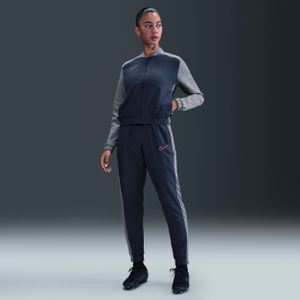 Nike Academy Dri-FIT geweven voetbaltrainingspak voor dames - Blauw