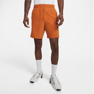 Nike Unlimited multifunctionele niet-gevoerde herenshorts met Dri-FIT (18 cm) - Oranje