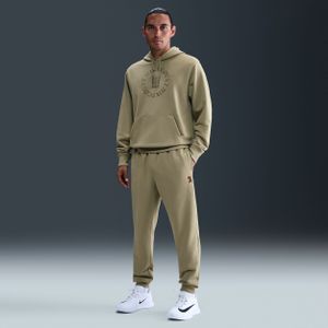 NikeCourt Heritage Dri-FIT tennisjoggingbroek van fleece voor heren - Bruin