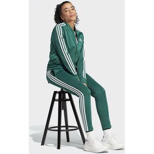 Trainingspak Essentials 3 stripes ADIDAS SPORTSWEAR. Polyester materiaal. Maten L. Groen kleur