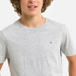 T-shirt met ronde hals in bio katoen TOMMY HILFIGER. Bio katoen materiaal. Maten 16 jaar - 174 cm. Grijs kleur