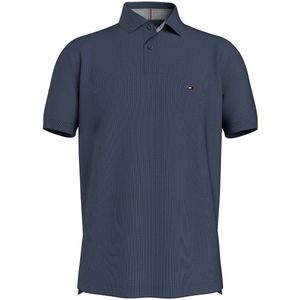 Rechte polo in stretch piquétricot TOMMY HILFIGER. Katoen materiaal. Maten M. Blauw kleur