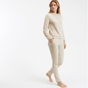 Effen pyjama in geribd fluweel SO'HOME. Polyester materiaal. Maten 38/40 FR - 36/38 EU. Beige kleur