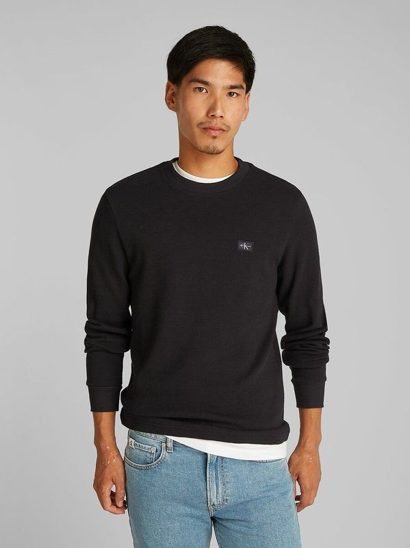 T-shirt met ronde hals en lange mouwen CALVIN KLEIN JEANS. Katoen materiaal. Maten S. Zwart kleur