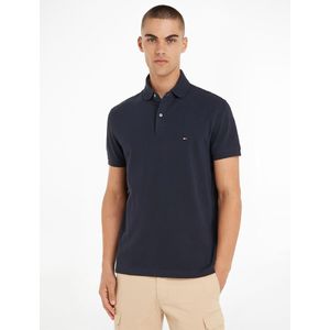 Rechte stretch polo, 2 knopen TOMMY HILFIGER. Katoen materiaal. Maten XS. Blauw kleur