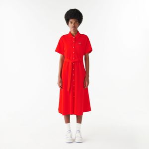 Polo jurk met strikceintuur, in piqué tricot katoen LACOSTE. Katoen materiaal. Maten 42 FR - 40 EU. Rood kleur
