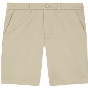 Slim-fit stretch korte broek CALVIN KLEIN. Katoen materiaal. Maten 33 US - 47 EU. Beige kleur