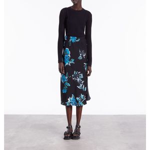 Halflange rok met bloemenprint en split THE KOOPLES. Polyester materiaal. Maten 3(L). Blauw kleur